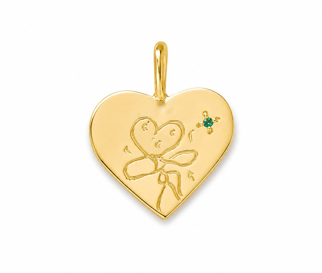 Child's drawing on a gold pendant