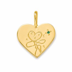 Child's drawing on a gold pendant