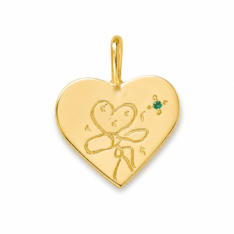 Child's drawing on a gold pendant